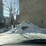 Pile of snow left in the disability parking area