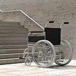 Wheelchair in front of a flight of steps