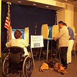 voter with disability at voting booth