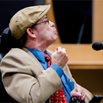 Disability advocate speaking at the Legislative Forum